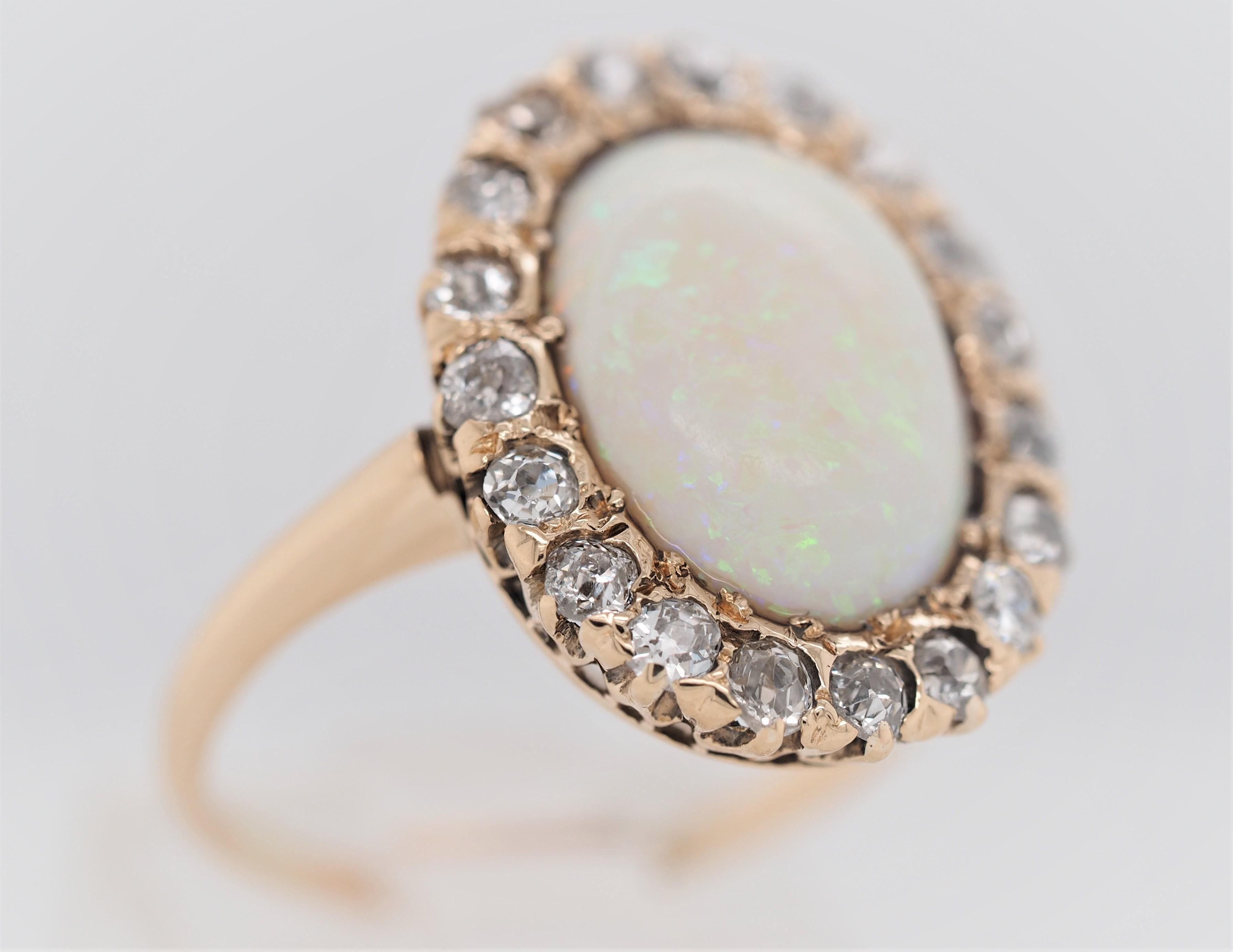 Contemporary 14 Karat Yellow and White Gold Oval Opal and 1 Carat Diamond Cocktail Ring For Sale