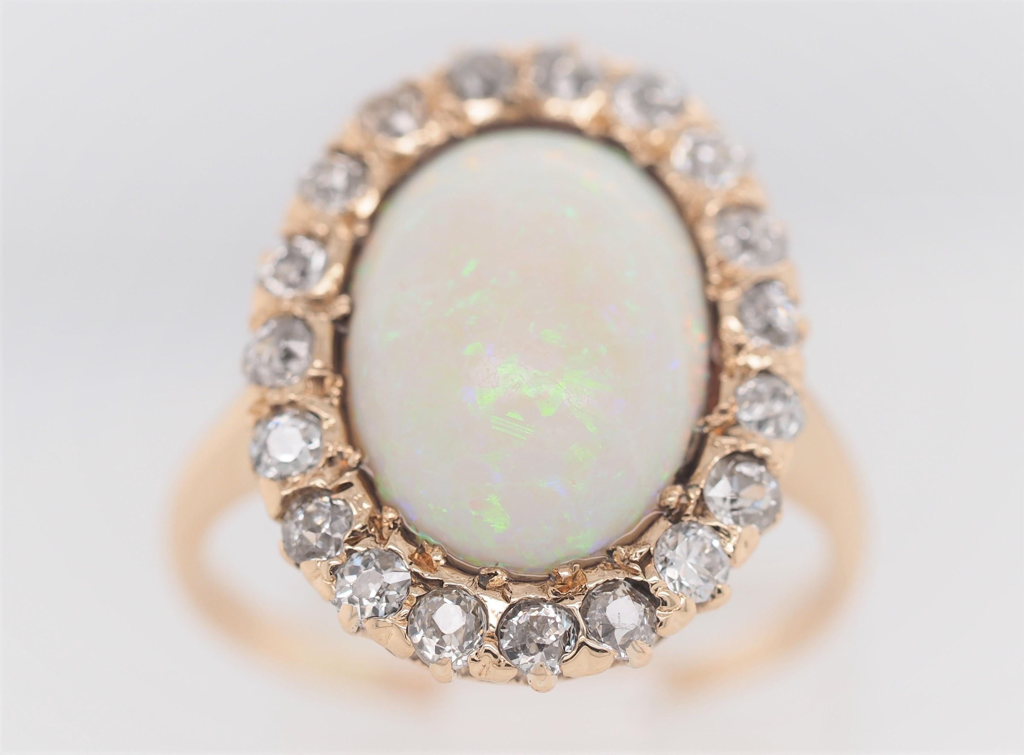 Oval Cut 14 Karat Yellow and White Gold Oval Opal and 1 Carat Diamond Cocktail Ring For Sale