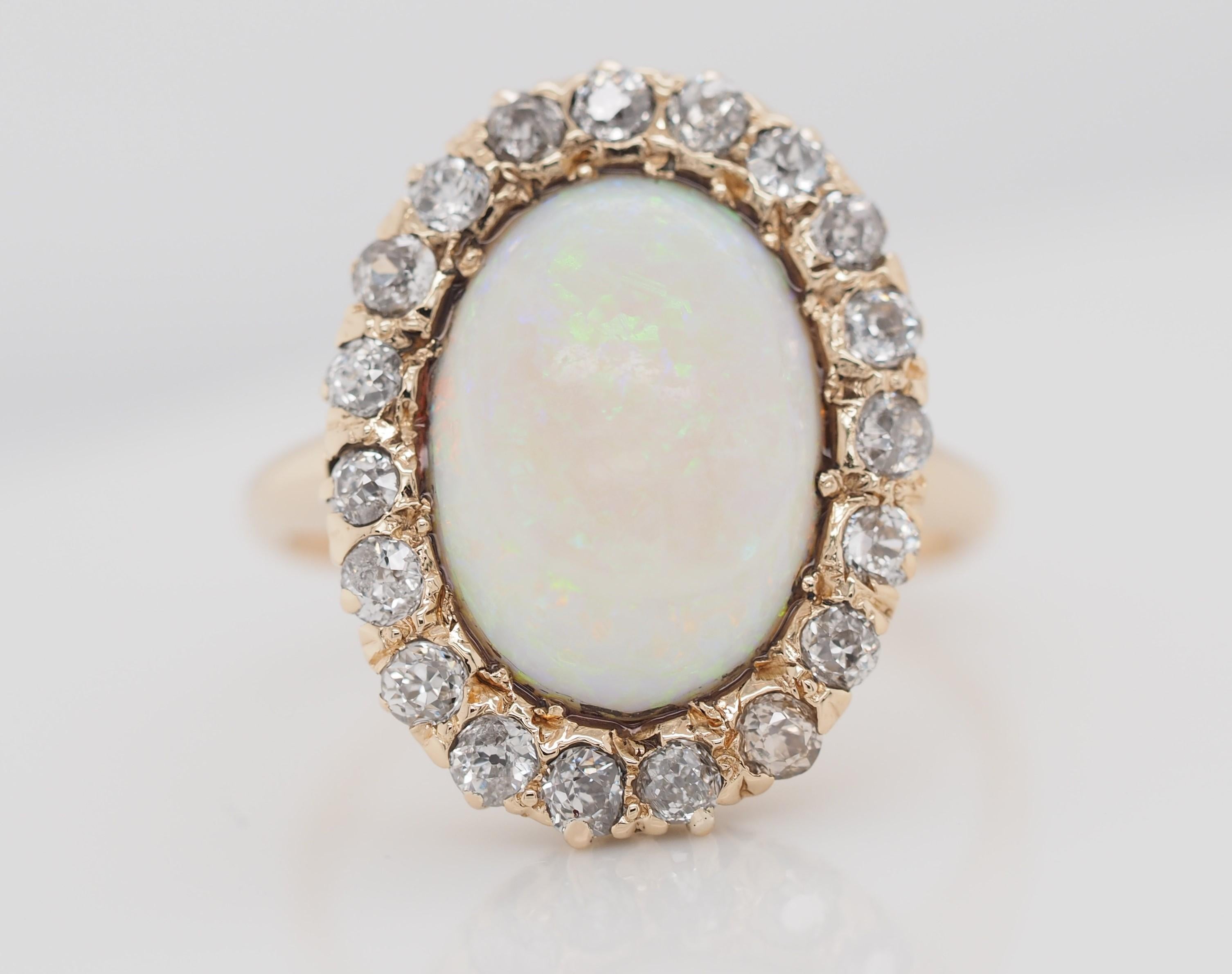 14 Karat Yellow and White Gold Oval Opal and 1 Carat Diamond Cocktail Ring For Sale 3