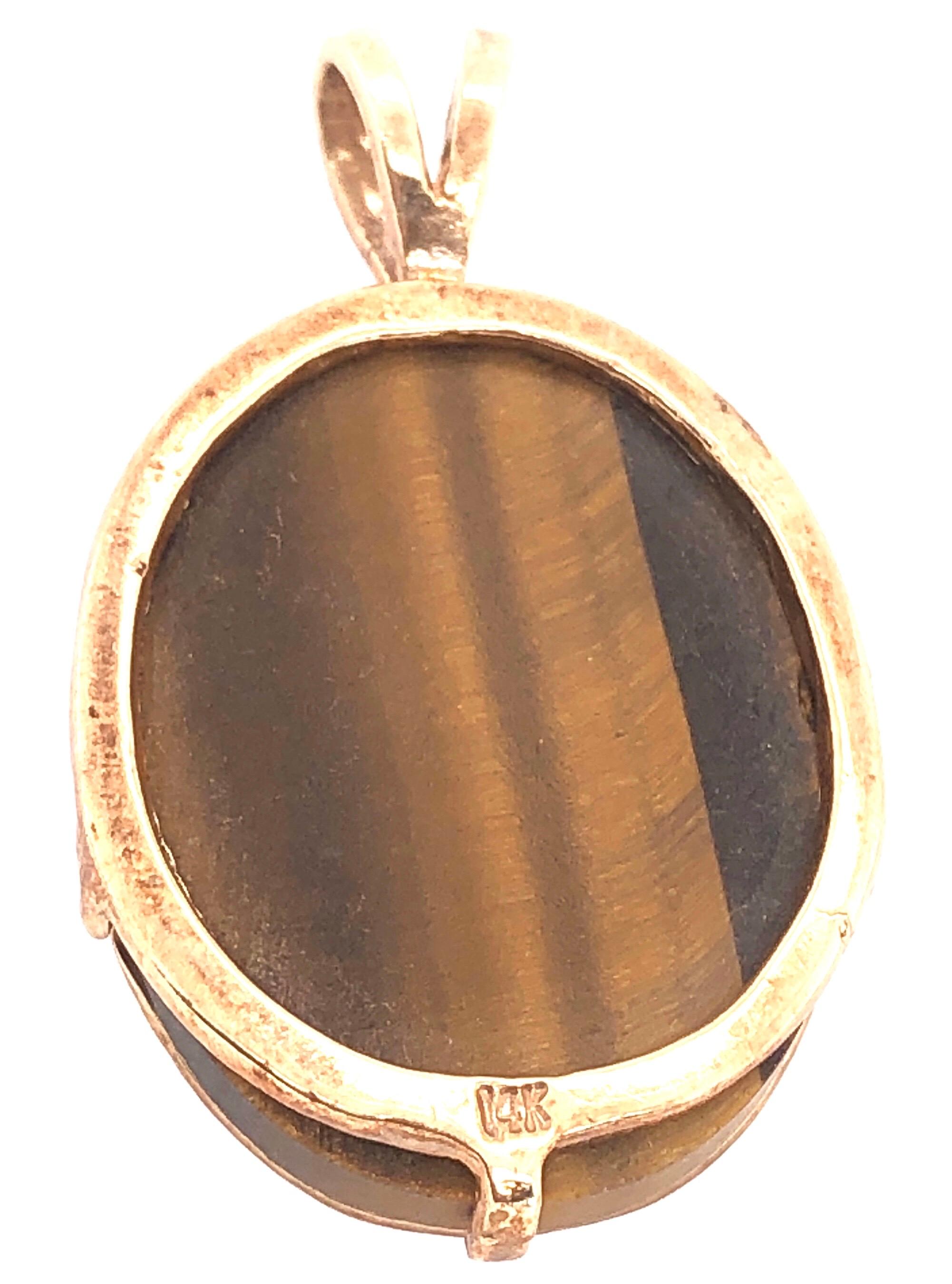 Women's or Men's 14 Karat Yellow and White Gold Pendant Tigers Eye Center Diamond Accent 0.02 TDW For Sale