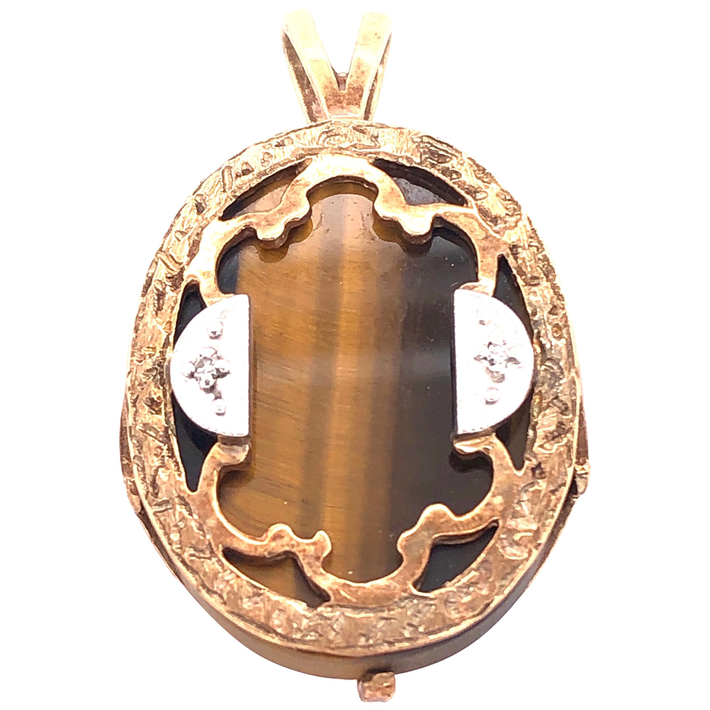 14 Karat Yellow and White Gold Pendant Tigers Eye Center Diamond Accent 0.02 TDW For Sale