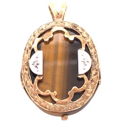 14 Karat Yellow and White Gold Pendant Tigers Eye Center Diamond Accent 0.02 TDW