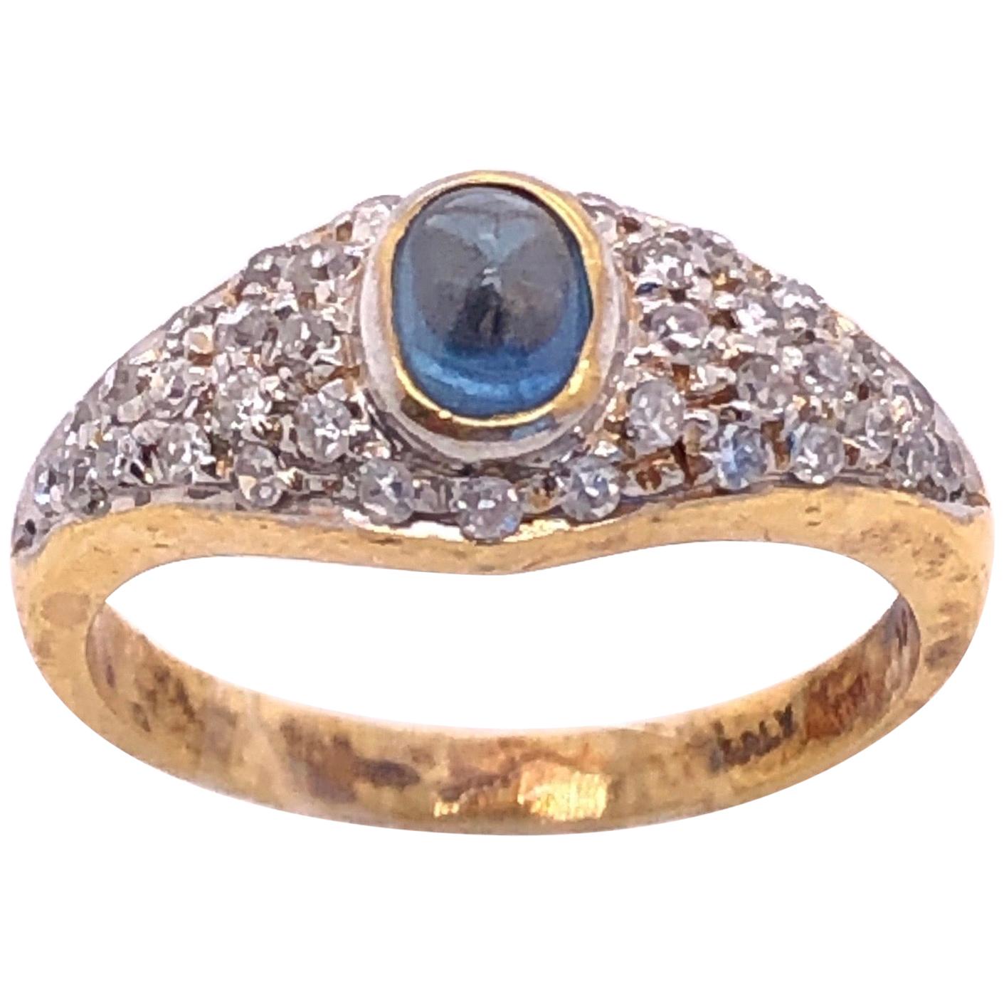 18 Karat Yellow and White Gold Ring Sapphire Cabochon and Encrusted Diamonds