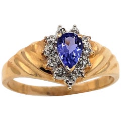 Bague en or jaune et blanc 14 carats Solitaire saphir avec accents diamantés