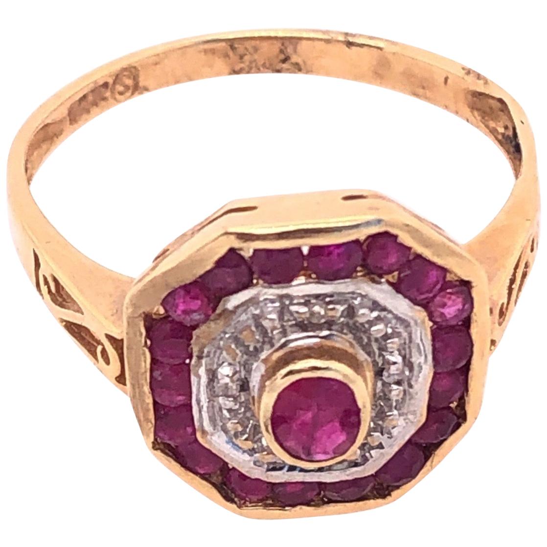 14 Karat Yellow and White Gold Ruby and Diamond Ring with Side Scroll