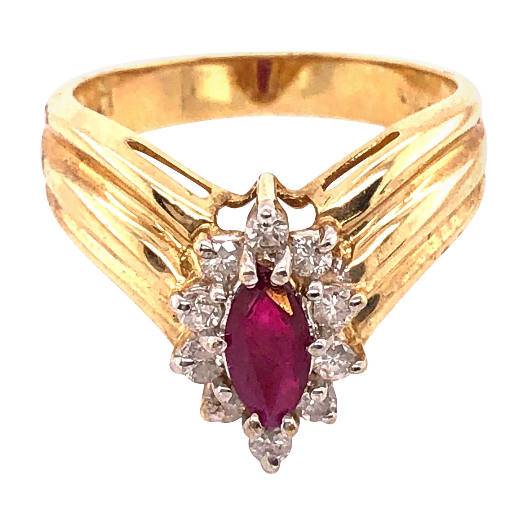 14 Karat Yellow and White Gold Ruby Ring with Diamond Accents 0.50 TDW