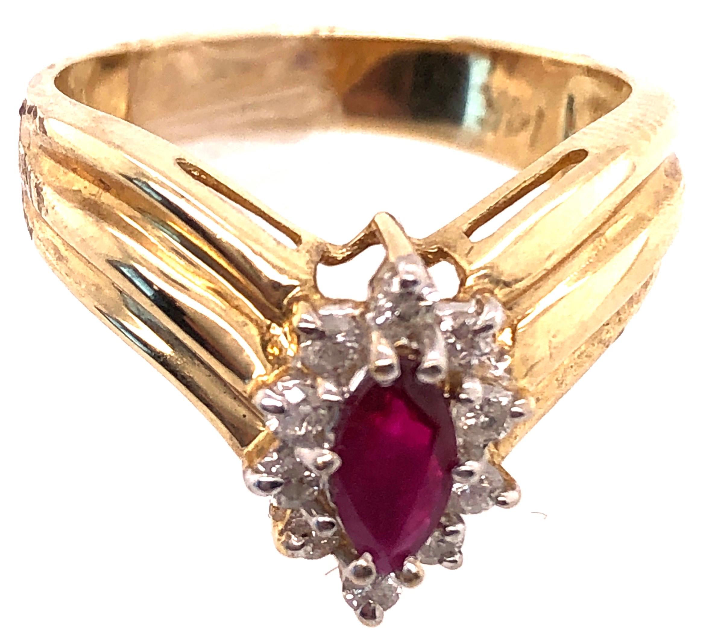 Oval Cut 14 Karat Yellow and White Gold Ruby Ring with Diamond Accents 0.50 TDW For Sale