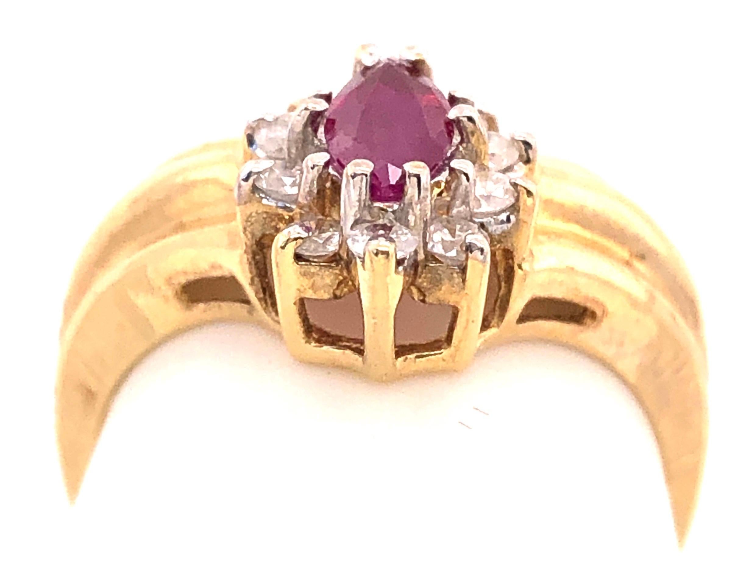 14 Karat Yellow and White Gold Ruby Ring with Diamond Accents 0.50 TDW For Sale 2