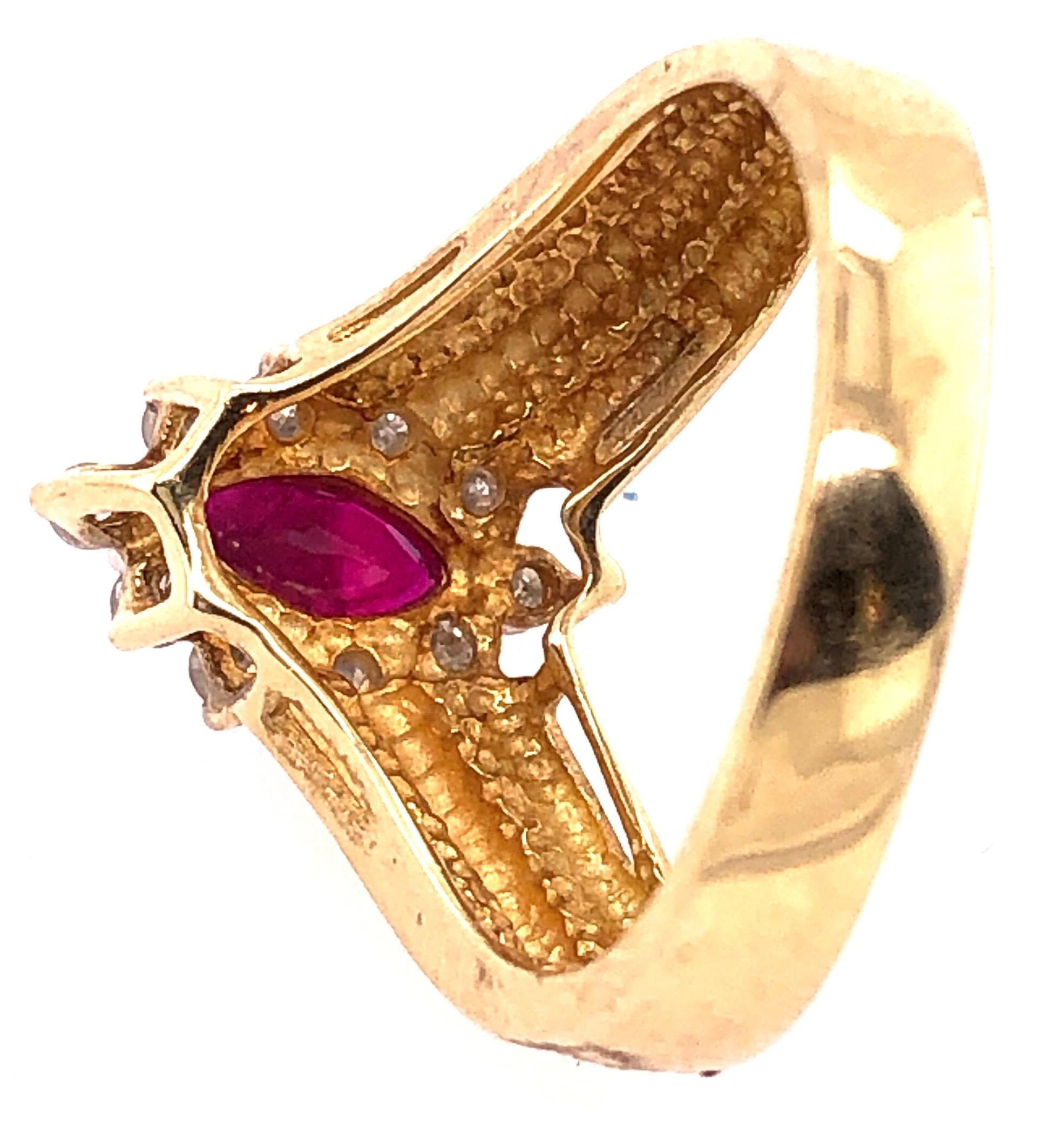 14 Karat Yellow and White Gold Ruby Ring with Diamond Accents 0.50 TDW For Sale 3