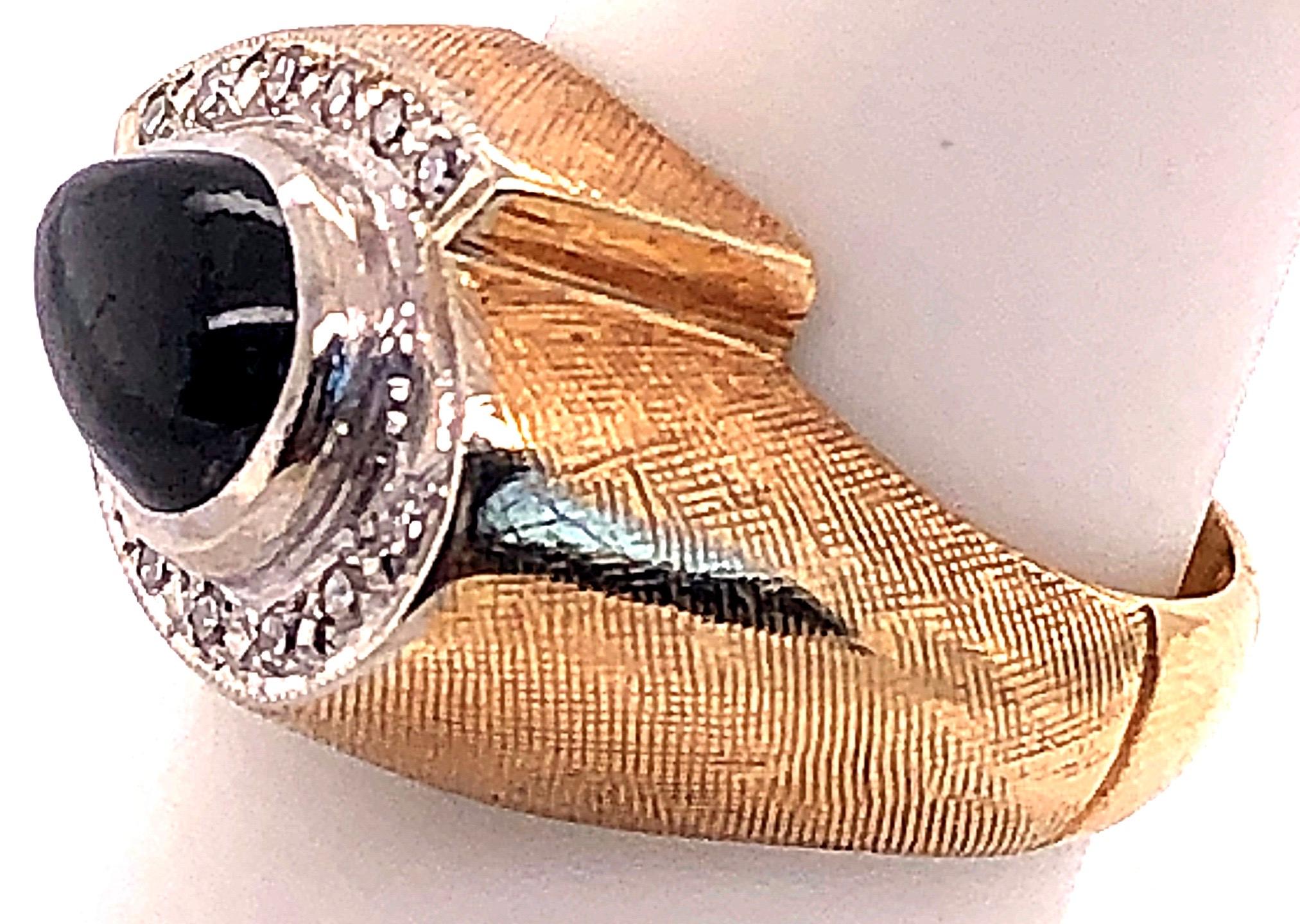 Contemporary 14 Karat Yellow and White Gold Sapphire Ring with Diamond Accents For Sale