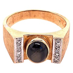 Anillo Solitario de Zafiro en Oro Amarillo y Blanco de 14 Kilates con Detalles de Diamantes