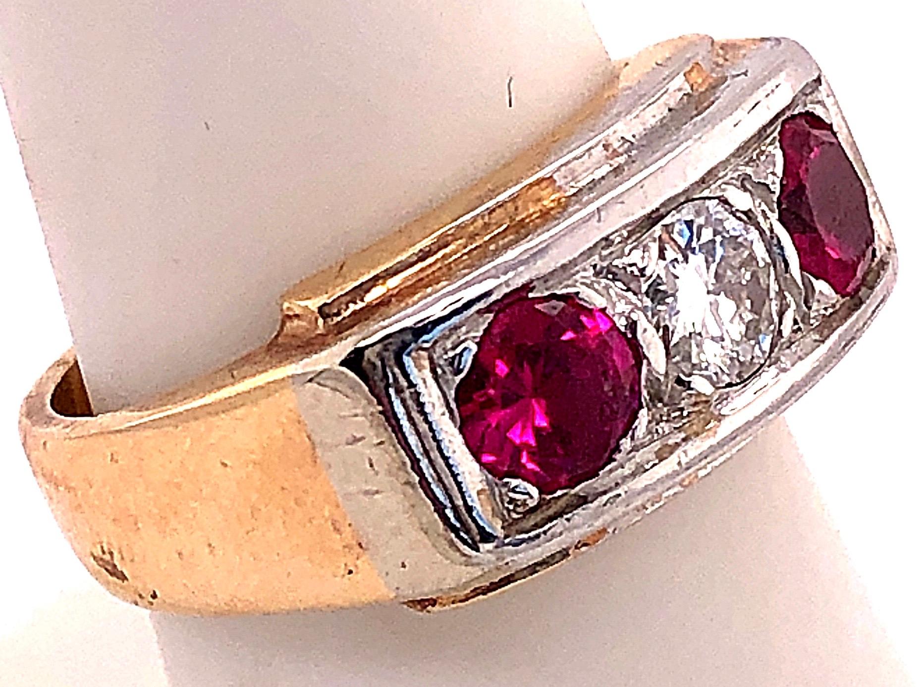 Contemporary 14 Karat Yellow and White Gold Three-Stone Diamond and Ruby Band Ring For Sale