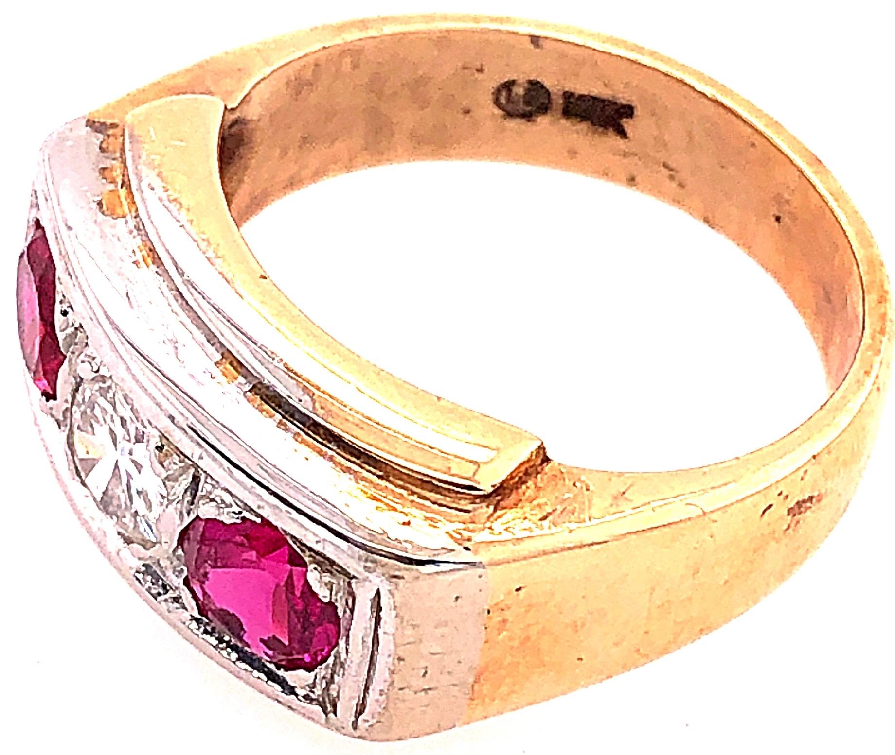 14 Karat Yellow and White Gold Three-Stone Diamond and Ruby Band Ring In Good Condition For Sale In Stamford, CT