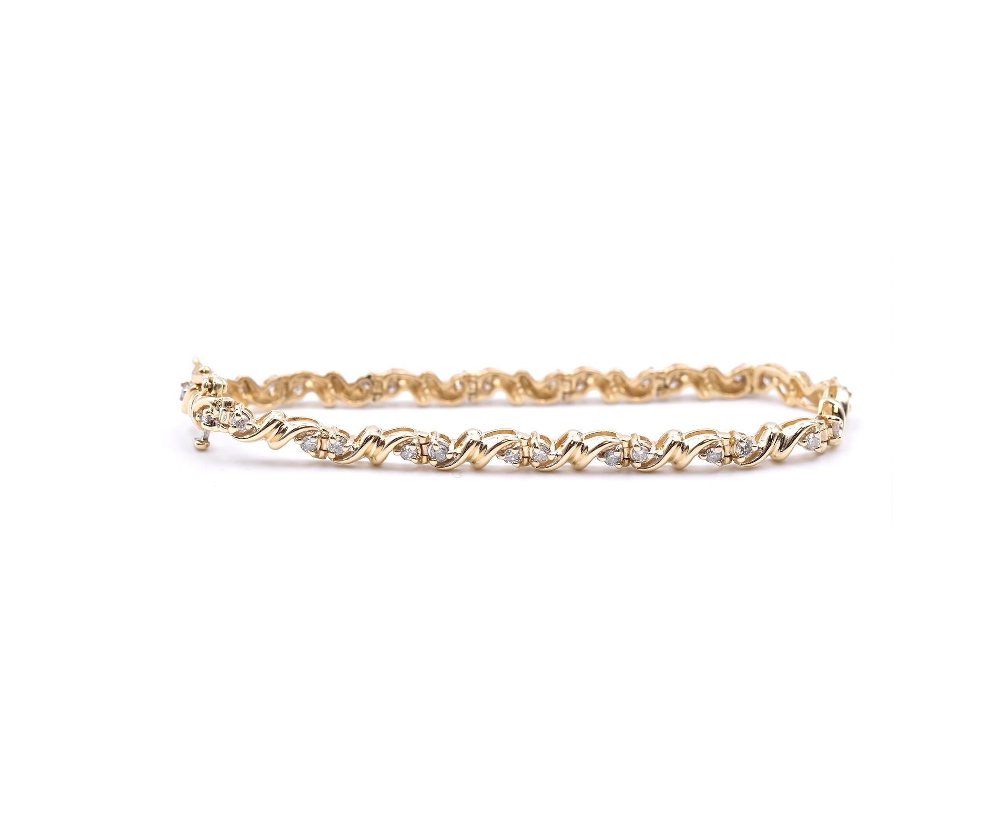 Material: 14K yellow gold 
Diamonds: 30 round cut = 1.00cttw
Color: G
Clarity: SI1
Dimensions: bracelet will fit up to a 7-inch wrist
Weight: 11.3 grams