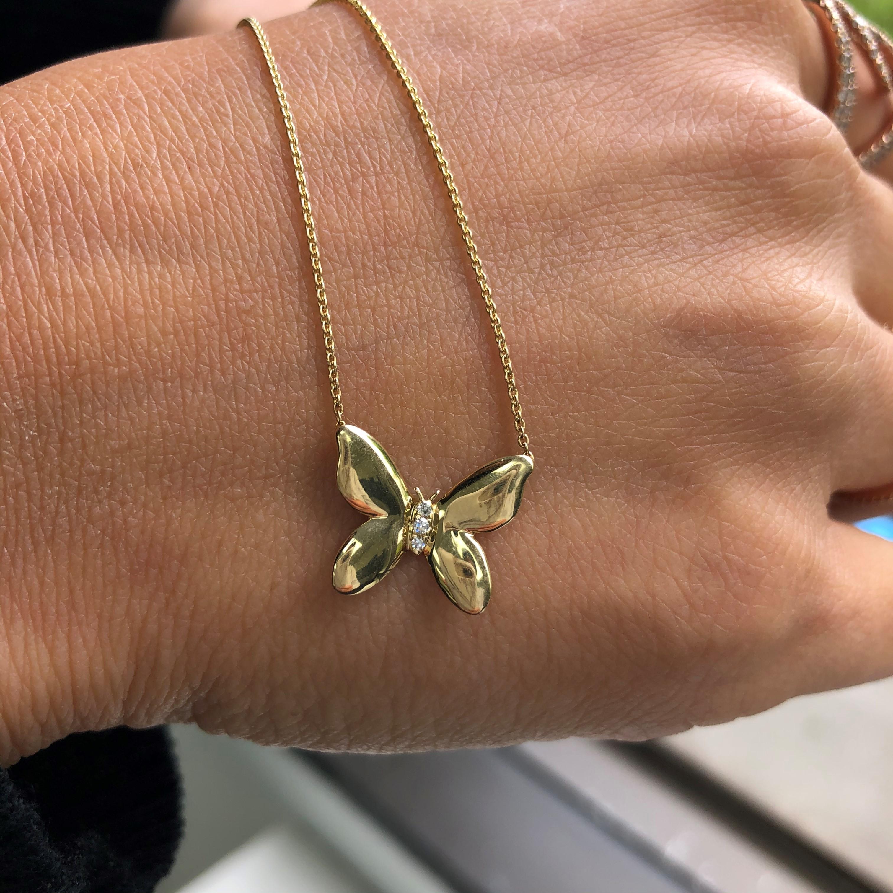 This Beautiful Butterfly Pendant is crafted of 14K Yellow Gold and features 0.02cts of round Diamonds. Adjustable Chain 16-18'' inches. Gorgeous for every day wear!
-14K Yellow Gold
-0.02cts Diamonds
-Round Natural Diamonds
-Diamond Color