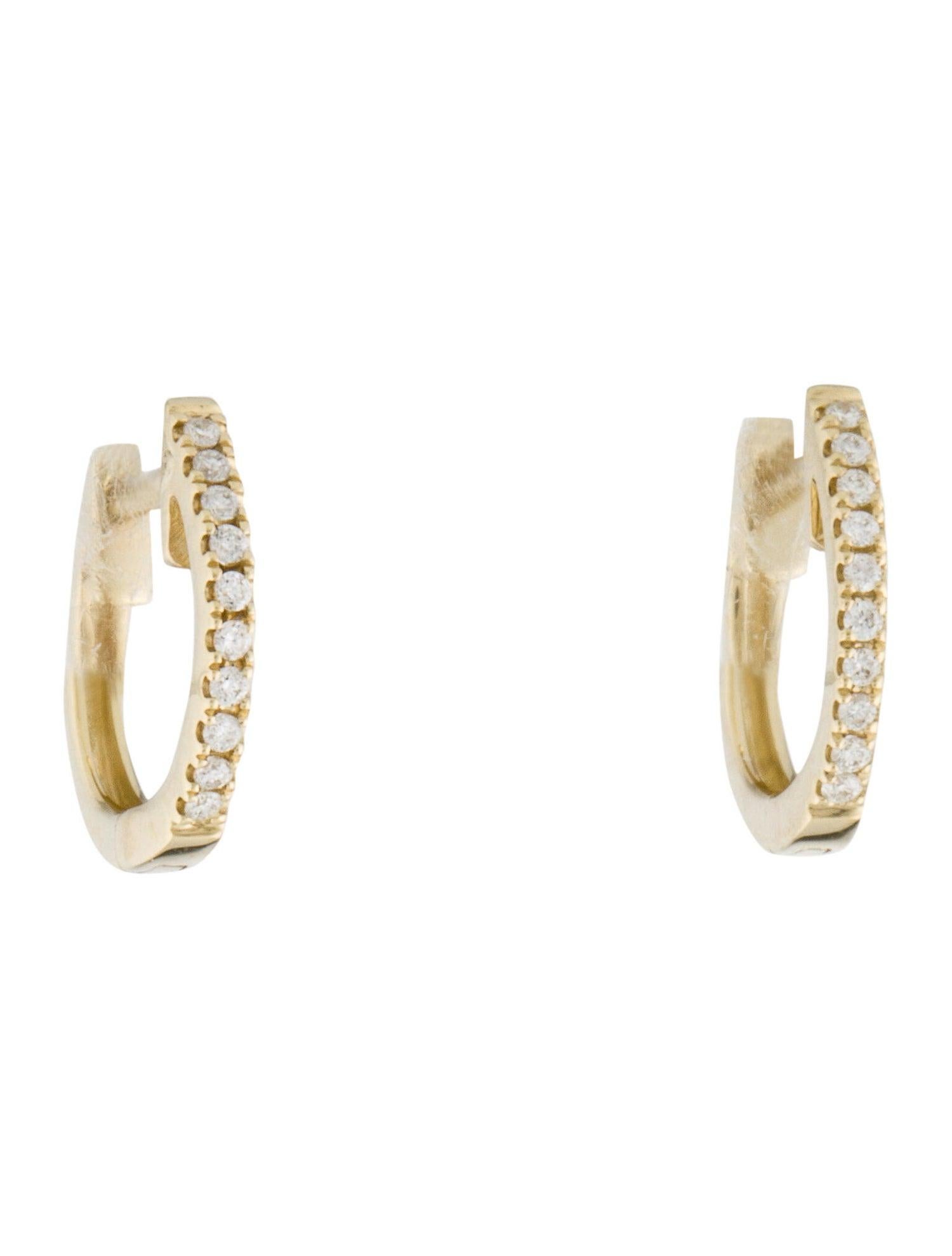 Simple yet stunning, these Diamond huggie hoops are crafted from 14k gold with 20 glittering white 0.06 ct. of diamonds. Each delicate U-shaped hoop features a single line of white diamonds, pave-set across the face in a gorgeous display. 1/2