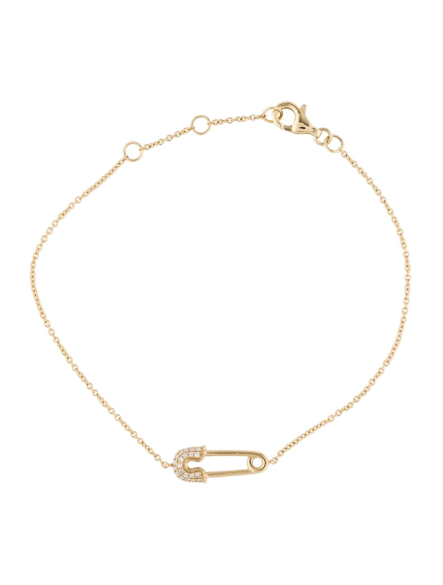 This Dainty Safety pin Bracelet is crafted of 14K yellow Gold and features 0.07 carats of natural round white Diamonds. Bracelet length is adjustable 6.75