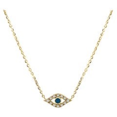 14 Karat Yellow Gold 0.08 Carat Diamond & Sapphire Evil Eye Necklace