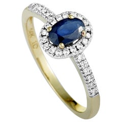 14 Karat Yellow Gold 0.14 Carat Diamond and Sapphire Small Oval Ring