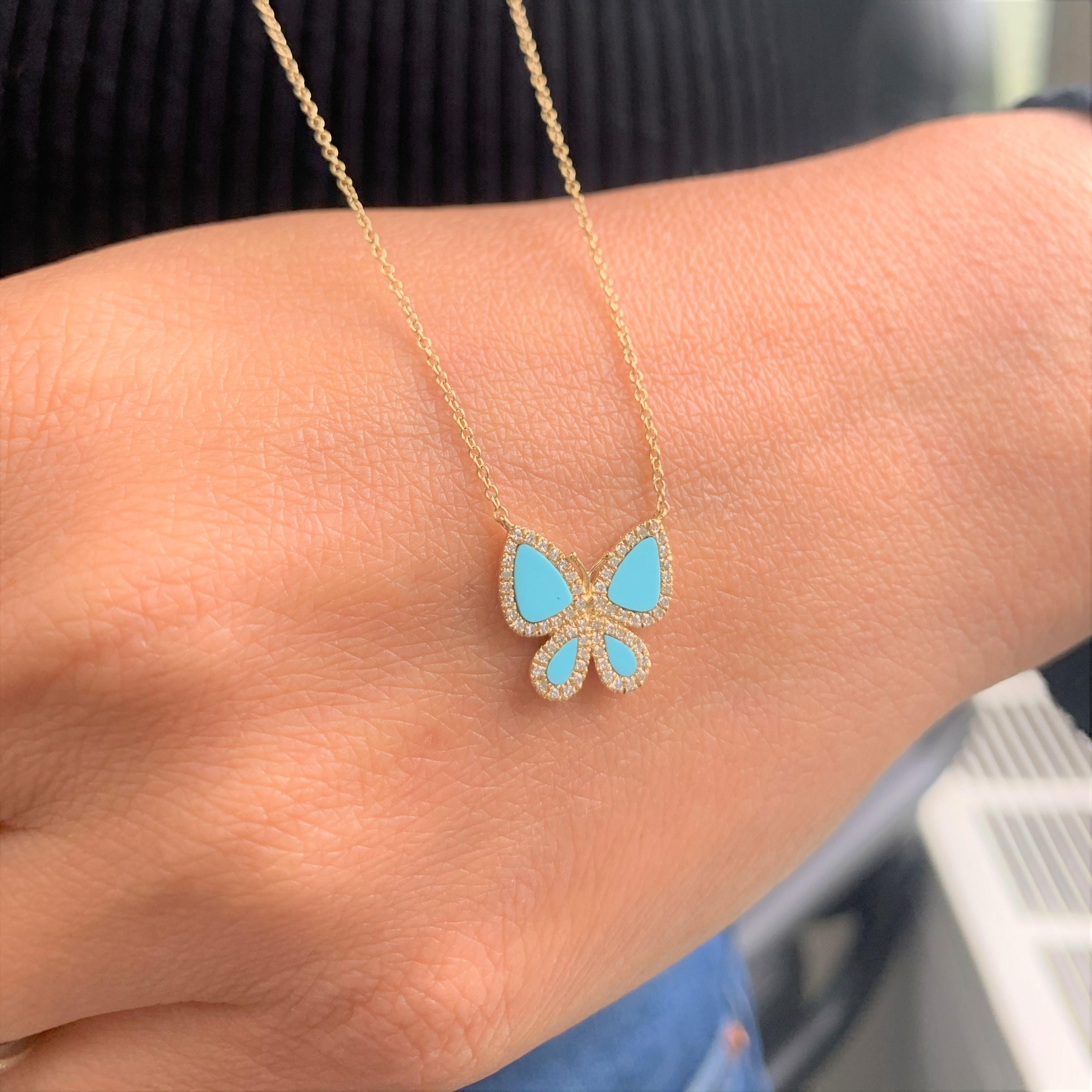 This is a Beautiful Butterfly Necklace! Crafted of 14K Yellow Gold featuring a Blue Turquoise Butterfly surrounded with a row of Diamonds approximately 0.15cts Chain is Adjustable 16-18
