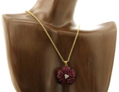 14 Karat Yellow Gold 0.16 Carat Diamonds 10.54 Carat Invisible Set Ruby Necklace