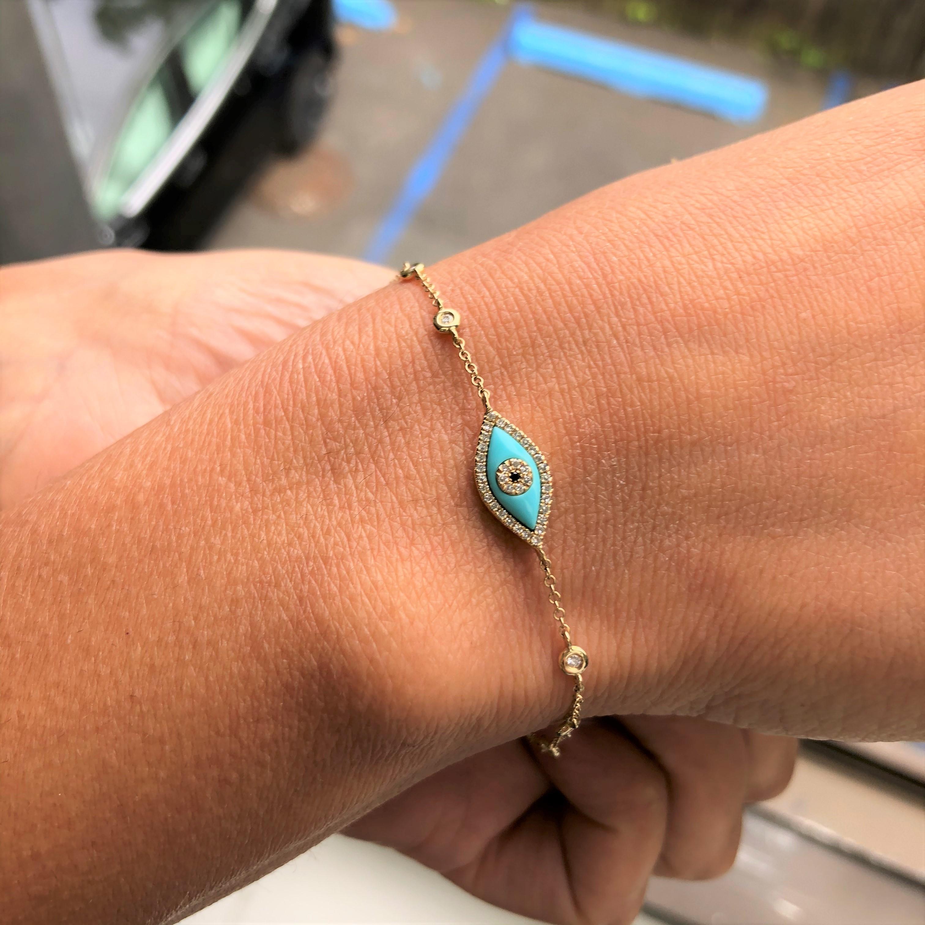 This is an adorable Turquoise Evil Eye Bracelet. It is crafted of 14k Gold with 0.17ct Round Sparkly Diamonds with the center of an eye being a black diamond. Diamond Color and Clarity GH-SI1-SI2. This piece is perfect for everyday wear and makes
