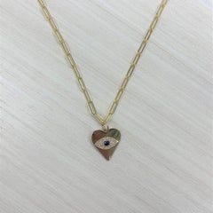 14 Karat Yellow Gold 0.18 Carat Diamond & Sapphire Evil Eye Heart Necklace