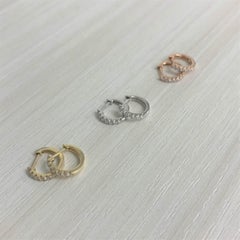 14 Karat Yellow Gold 0.20 Carat Diamond Huggie Earrings