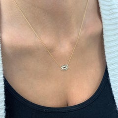 14 Karat Yellow Gold 0.24 Carat Diamond and Sapphire Evil Eye Necklace