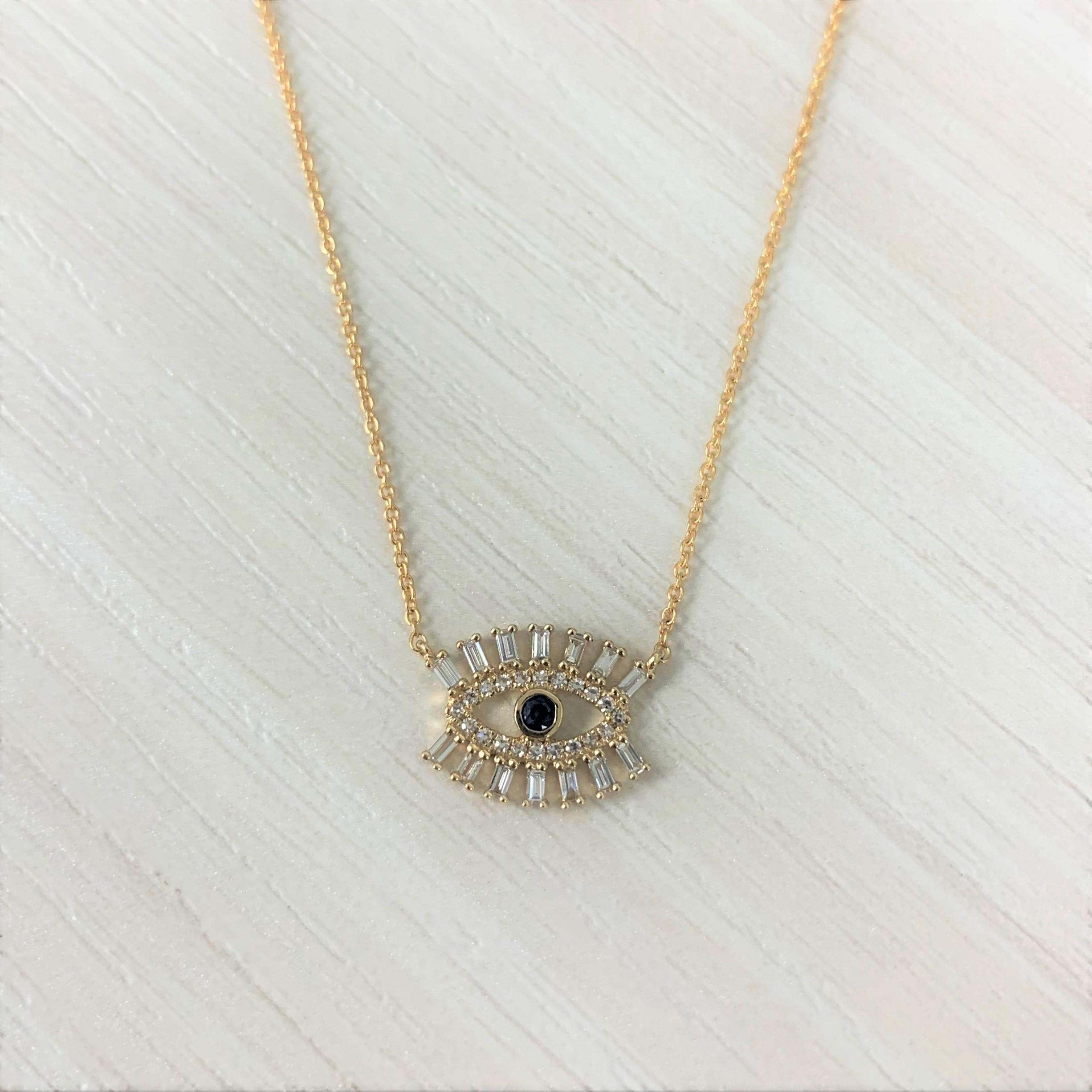 Contemporary 14 Karat Yellow Gold 0.24 Carat Diamond and Sapphire Evil Eye Necklace For Sale