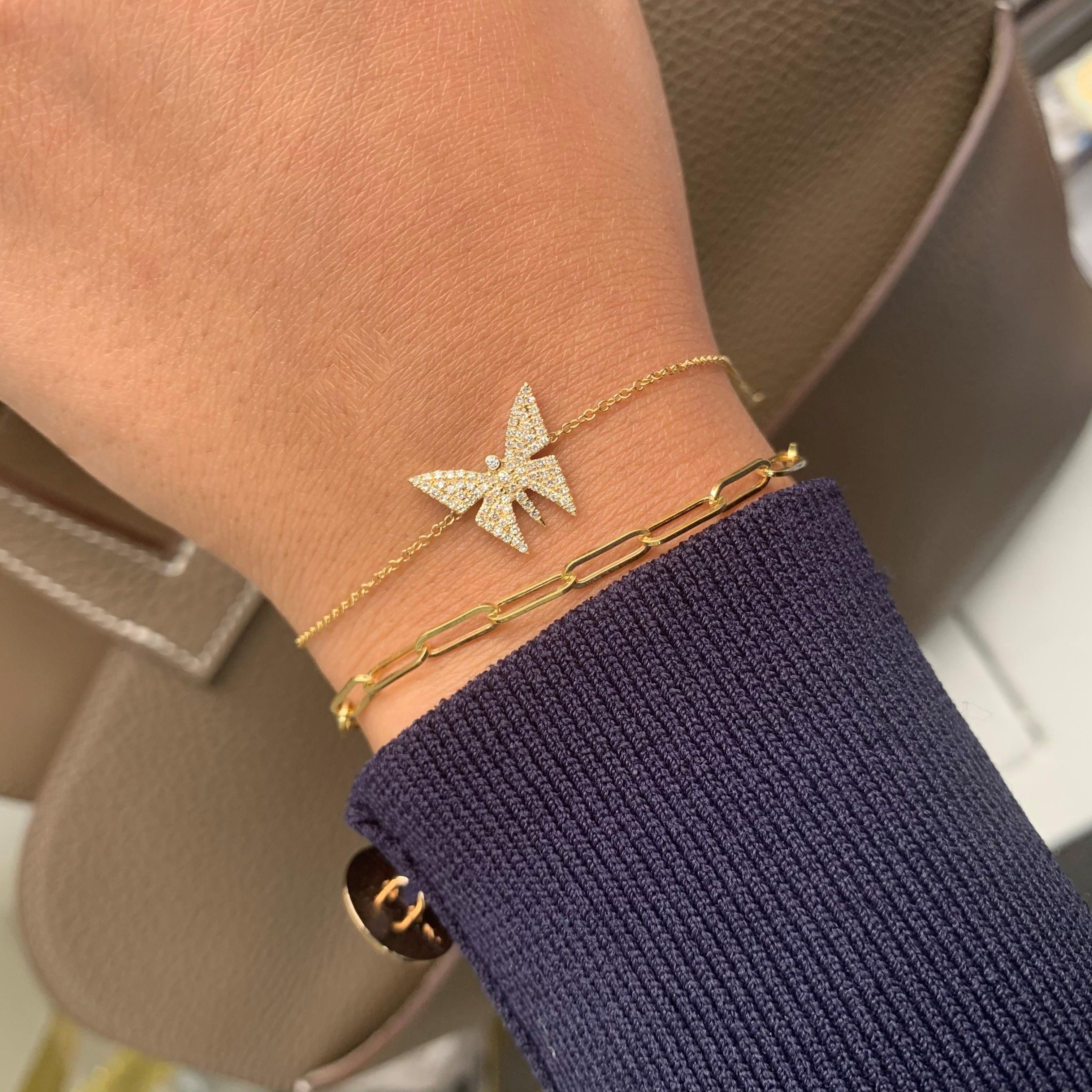 Questo bellissimo bracciale a farfalla è realizzato in oro giallo 14 carati e presenta 0,25 carati di diamanti bianchi naturali. Il braccialetto misura 6,5 pollici di lunghezza.
-Oro giallo 14K
-0,25 carati di diamanti bianchi naturali