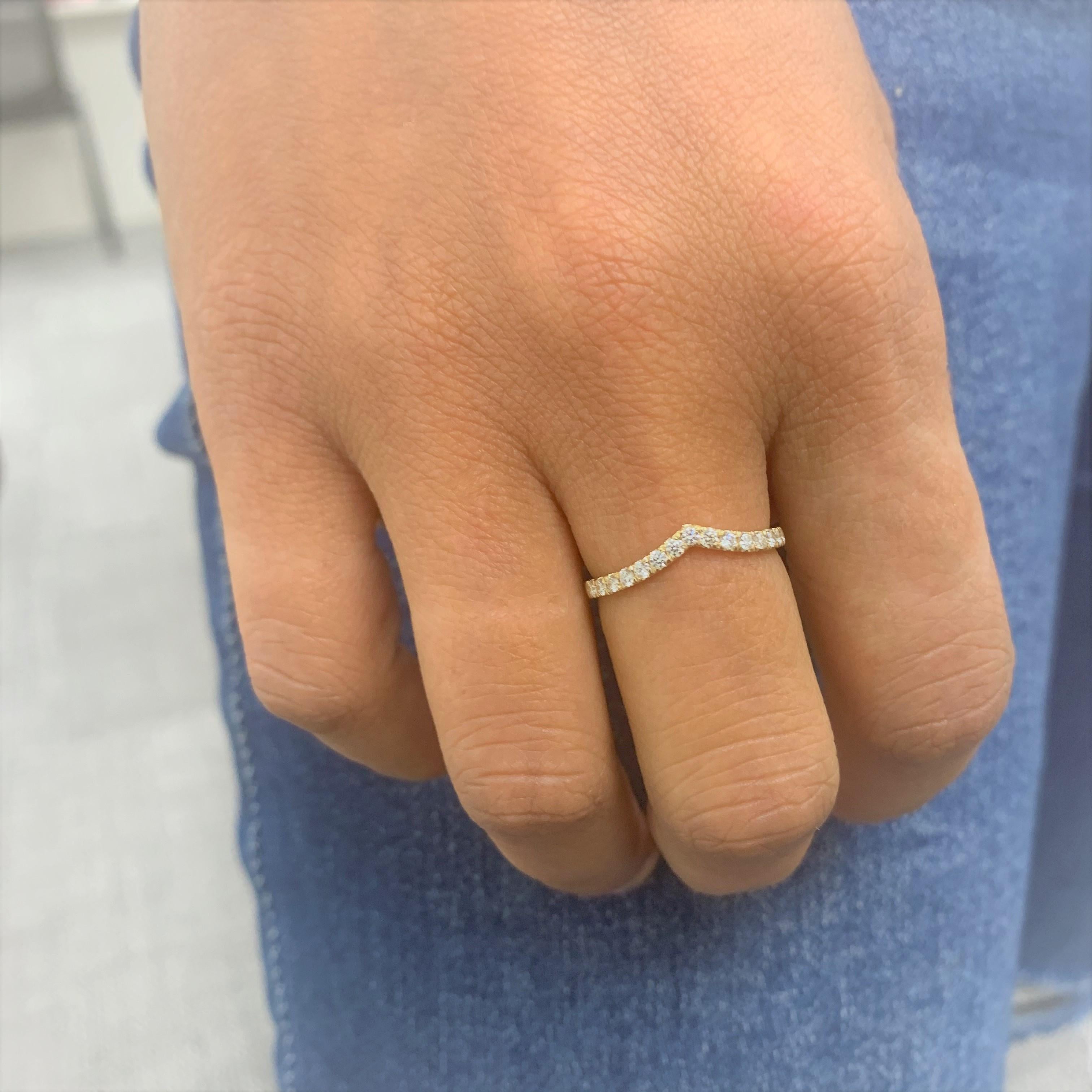 This Stunning and Elegant V-Shaped Band will add that perfect Glamour to your hands! Crafted of 14K Gold and available in 3 gold colors this band features 15 round natural white Diamond weighing 0.25 carats. Ring size 6.5
-14K Yellow Gold
-15 Round