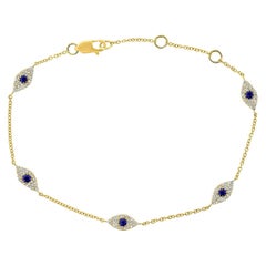 Bracelet Evil Eye en or jaune 14 carats avec diamants et saphirs de 0,26 carat