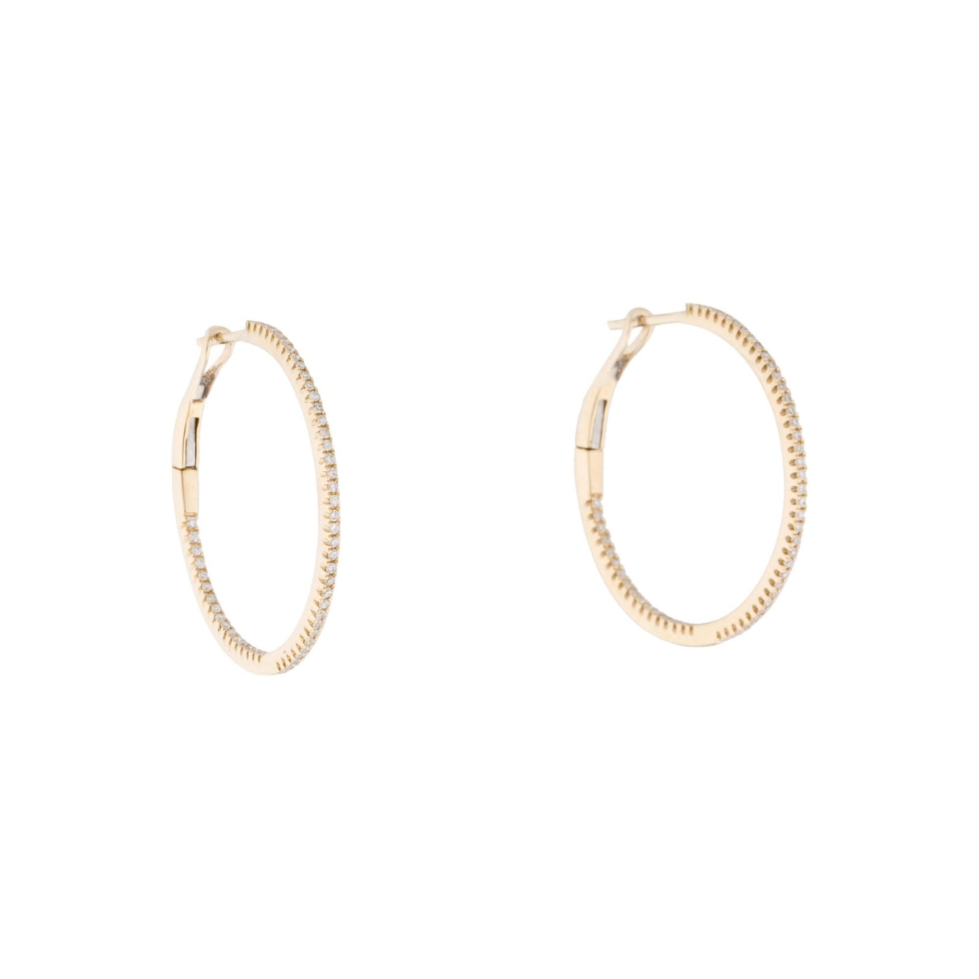 Light up your favorite looks with the brilliance of diamonds! Shimmering and bright, these gorgeous narrow round hoops glisten with approximately 0.30ct diamonds along the outer edge. Diamond color and clarity is GH SI1-SI2. Lever backs provide a