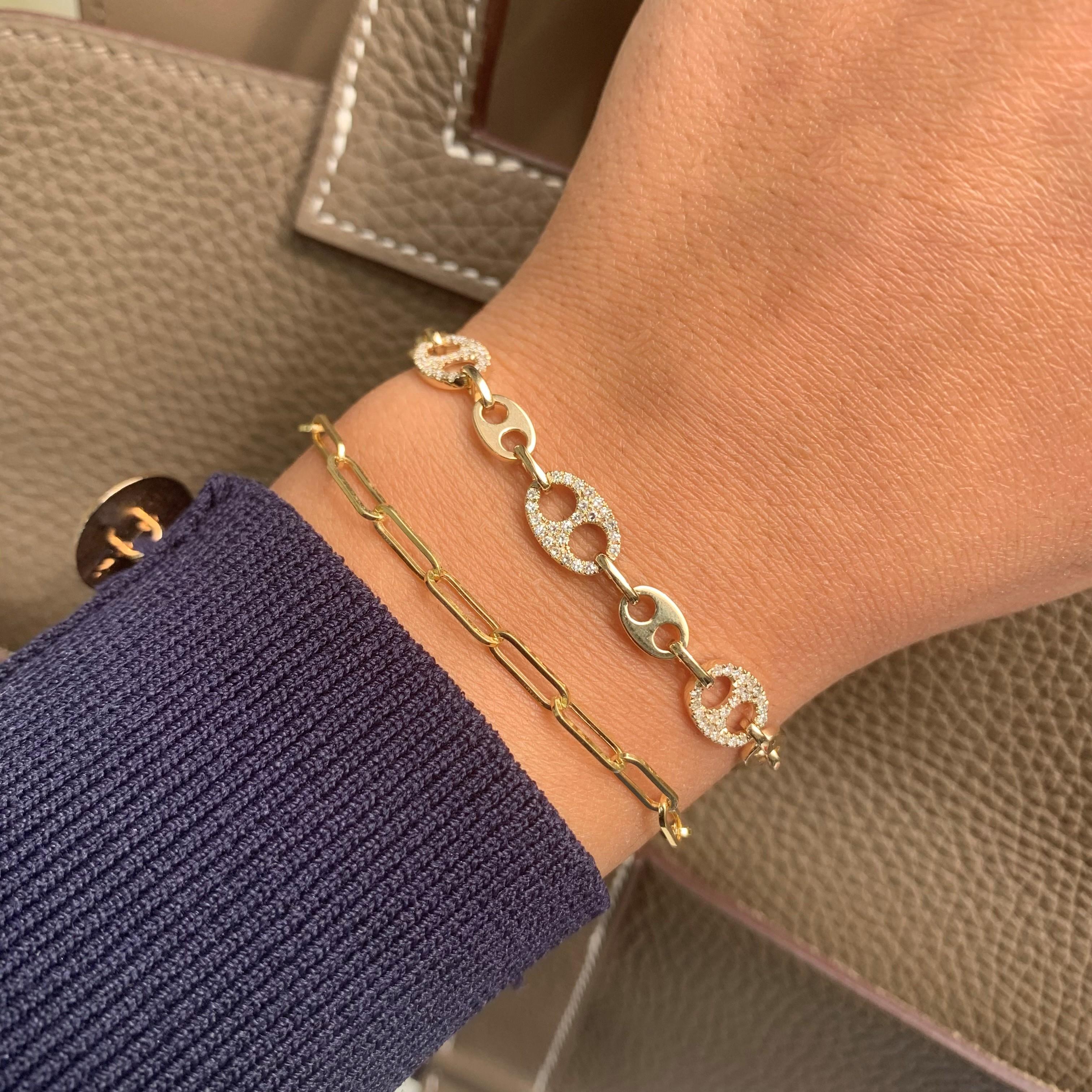 This Beautiful and Charming link bracelet will add the perfect glamour to your look! Crafted of 14K yellow gold this bracelet features 0.38cts of natural round white Diamonds, spring-ring closure. Adjustable lengths 5.75