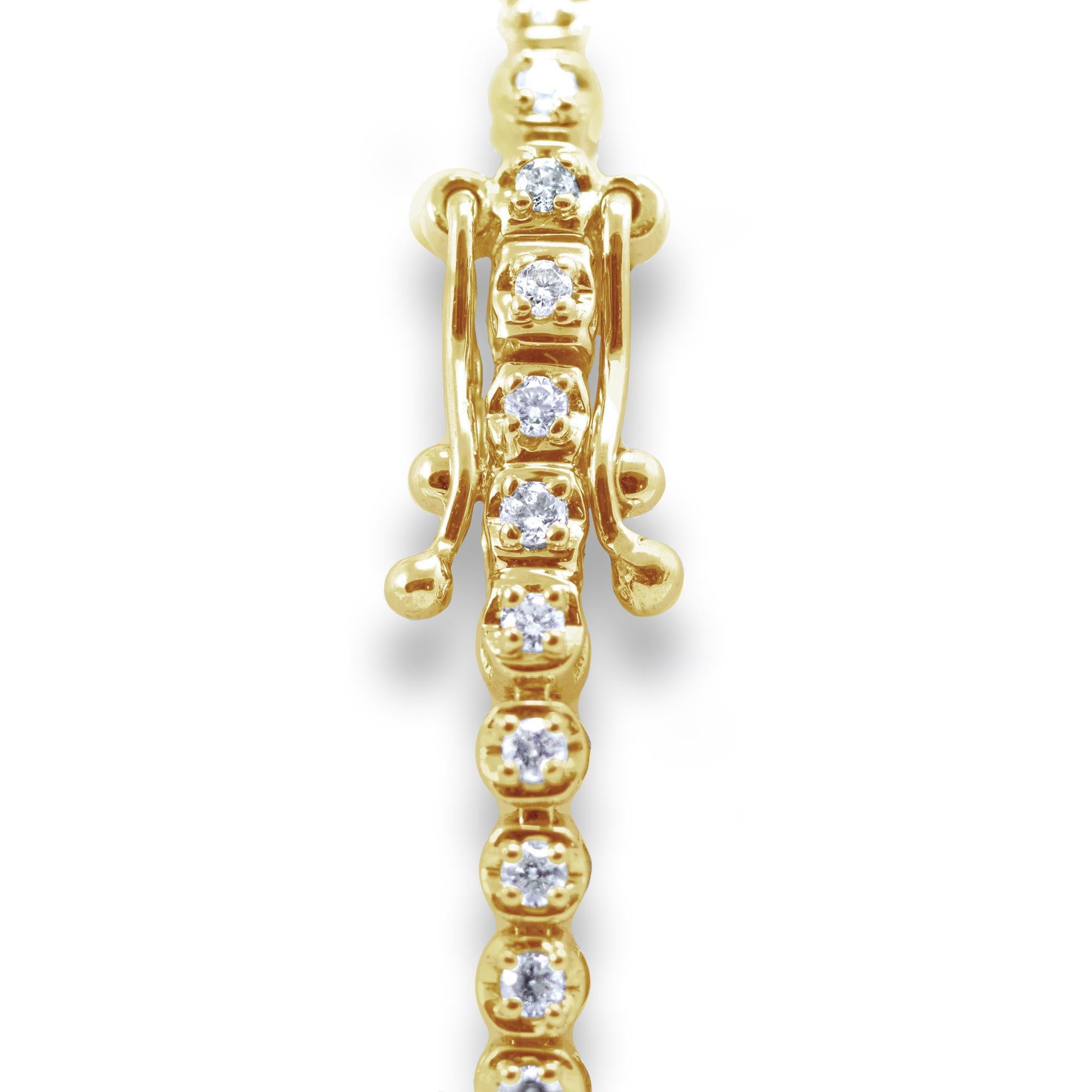 This Round Brilliant Diamond Tennis Bracelet is made in 14 karat Yellow Gold, set with natural, colourless diamonds. With a total diamond carat weight (approximate) of 0.50 carat, The Diamonds are G-H colour, VS-Si clarity. Also comes in 14 karat