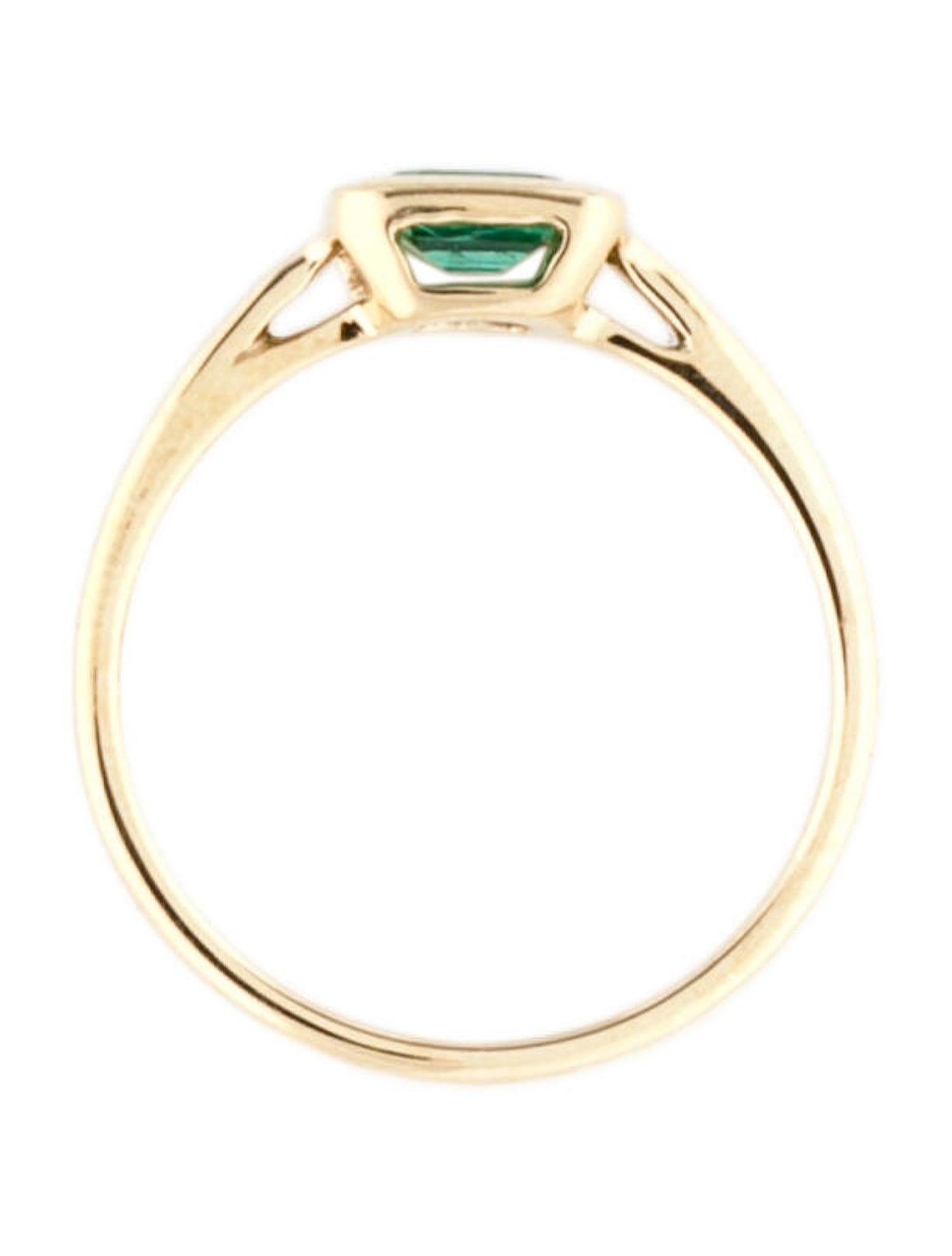 14 Karat Yellow Gold 0.60 Ct. Green Emerald Solitaire Ring In New Condition For Sale In Great neck, NY