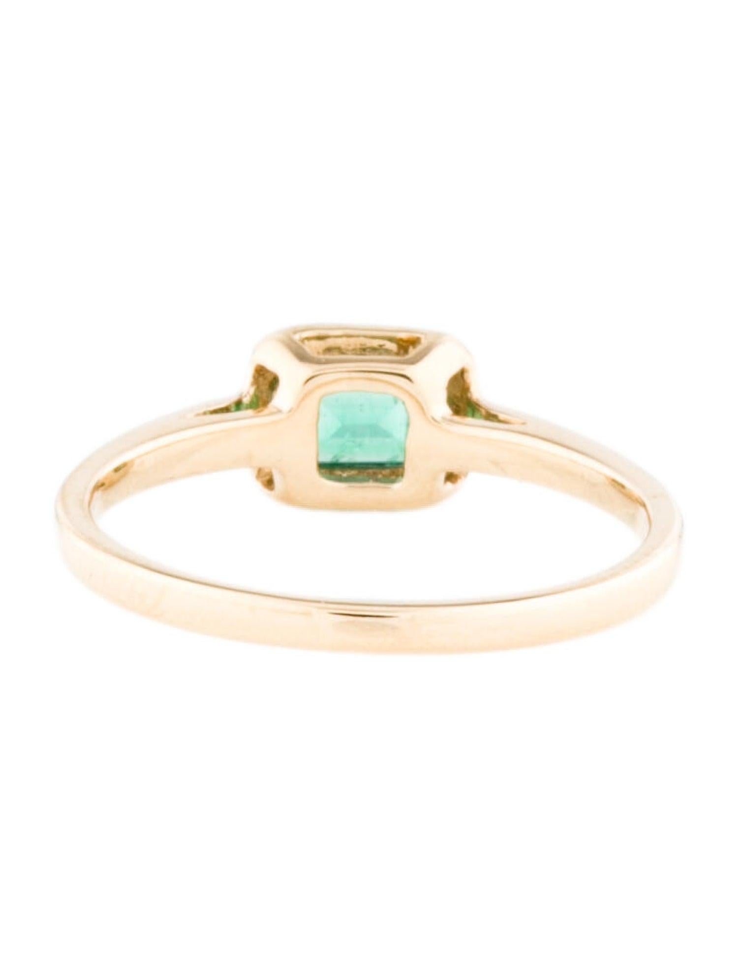 Women's 14 Karat Yellow Gold 0.60 Ct. Green Emerald Solitaire Ring For Sale