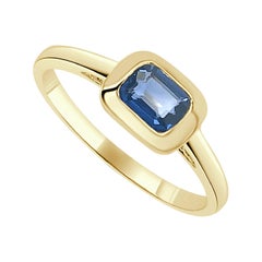 Or jaune 14 carats 0,65 carat Bague solitaire en saphir bleu