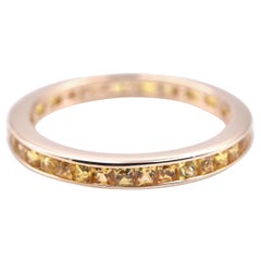 14 Karat Yellow Gold 0.68 Carat Channel Set Yellow Sapphire Eternity Band