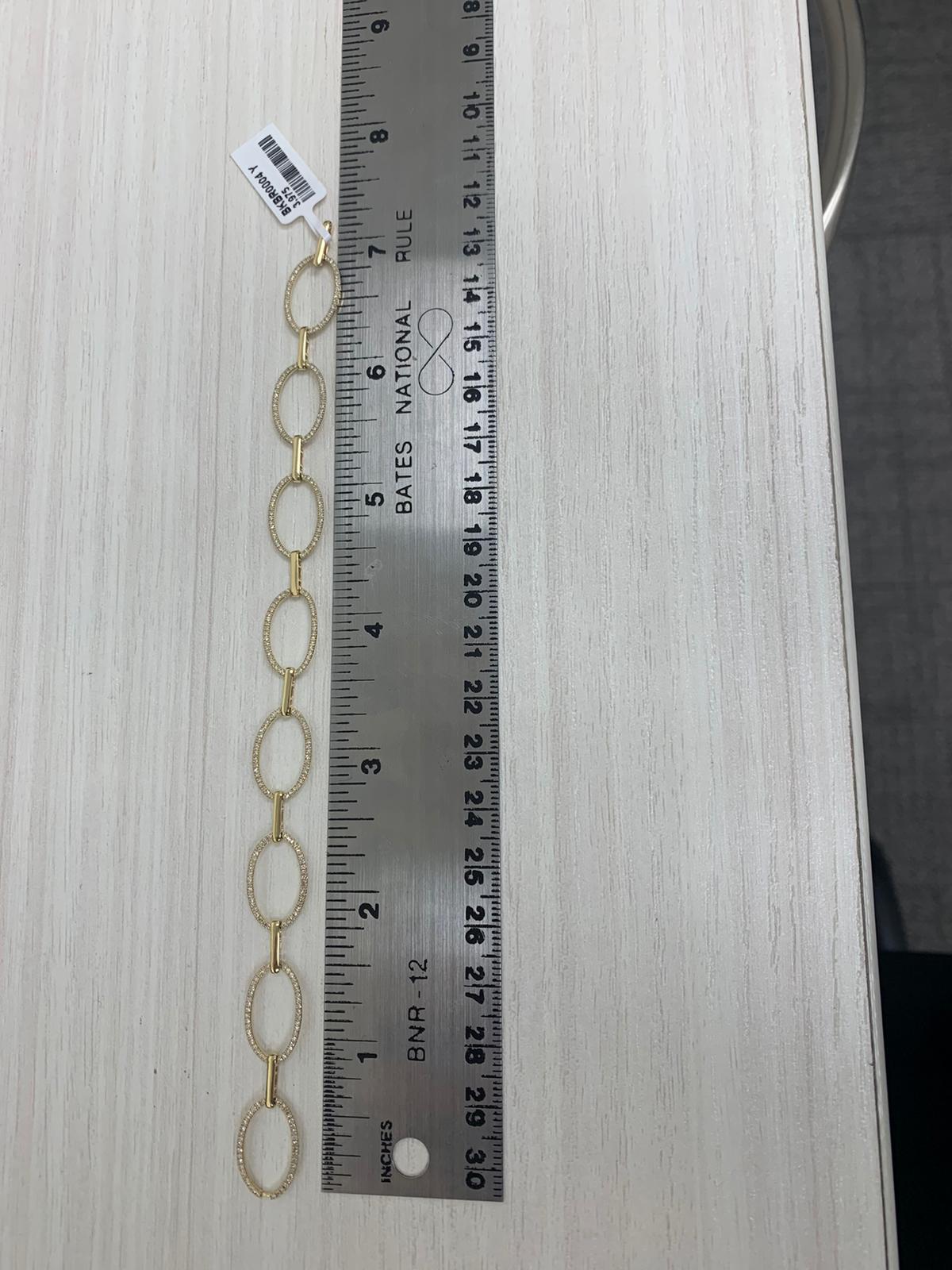 Round Cut 14 Karat Yellow Gold 0.69 Carat Diamond Oval Link Bracelet For Sale