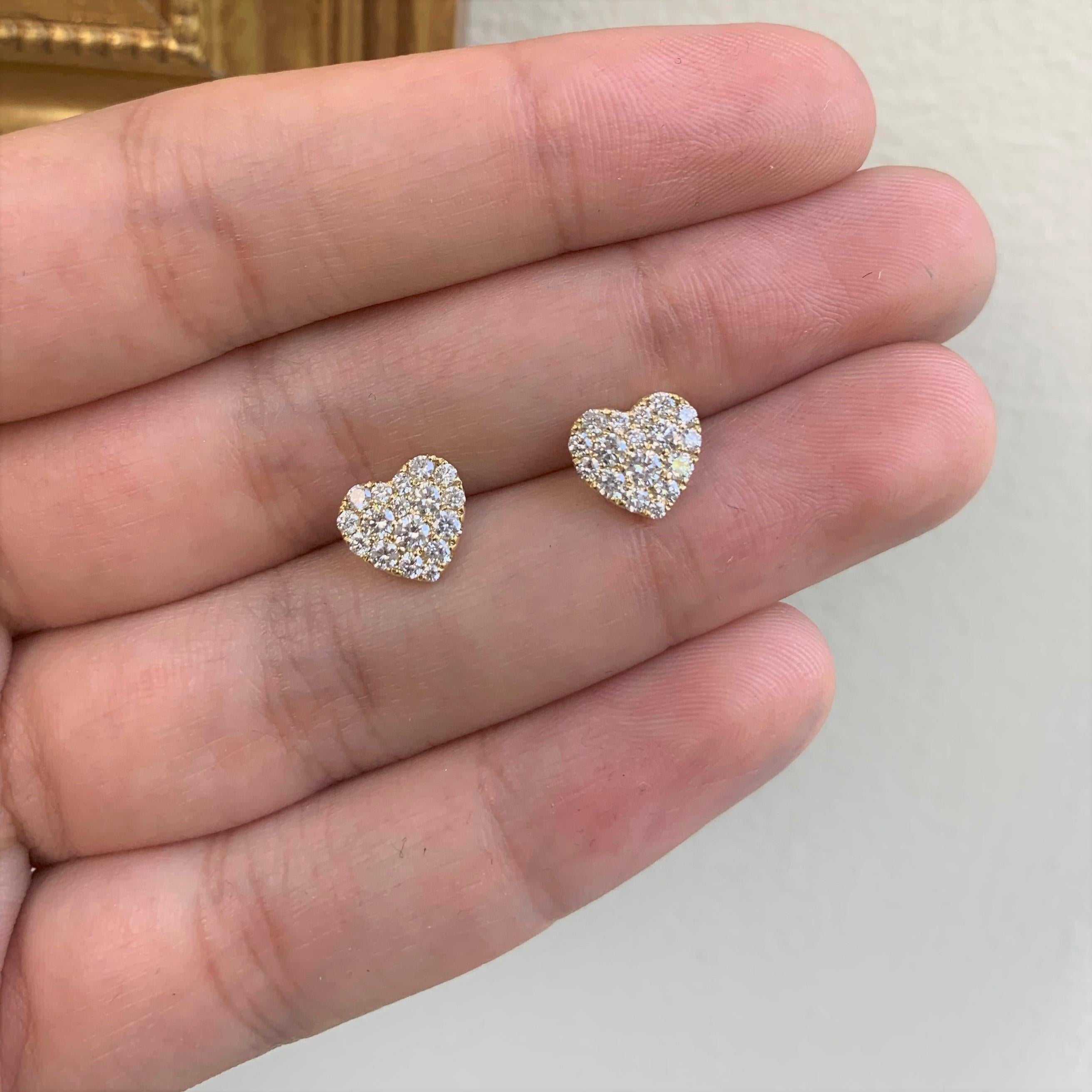 These Pretty and Chic Heart Stud Earrings are crafted of 14K Gold featuring approximately 0.70 cts of round Diamonds, Color & Clarity is GH-SI1. Secured with Butterfly push backs.
-Diamond Weight: 0.70 ct.
-Diamond Clarity: SI
-Diamond Color: