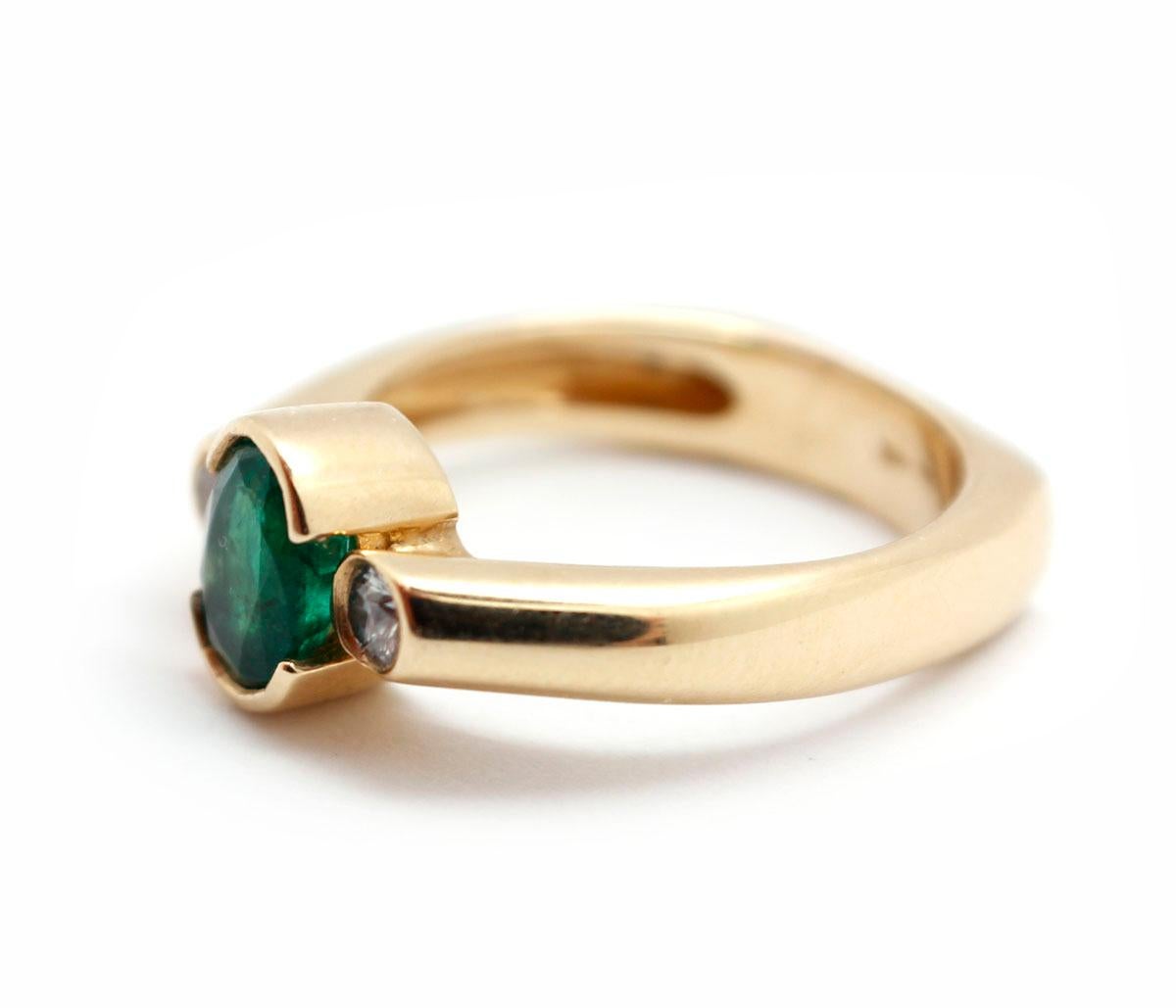 Modern 14 Karat Yellow Gold, 0.75 Carat Emerald and 0.17 Carat Diamond Ring