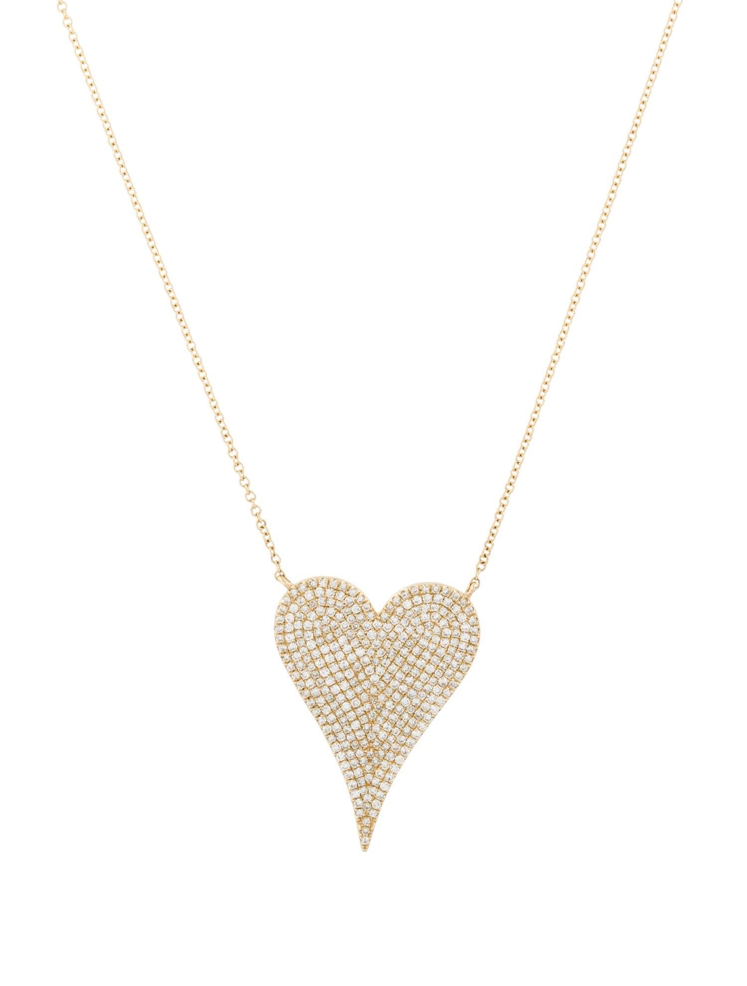 This Stunning & Exotic Pave Diamond Heart Pendant crafted of 14K White Gold features approximately 0.79Ct of Round Natural Diamonds, on a adjustable 16,17 & 18