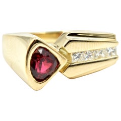 14 Karat Yellow Gold, 0.80 Carat Round Diamond and Trilliant Garnet Fashion Band