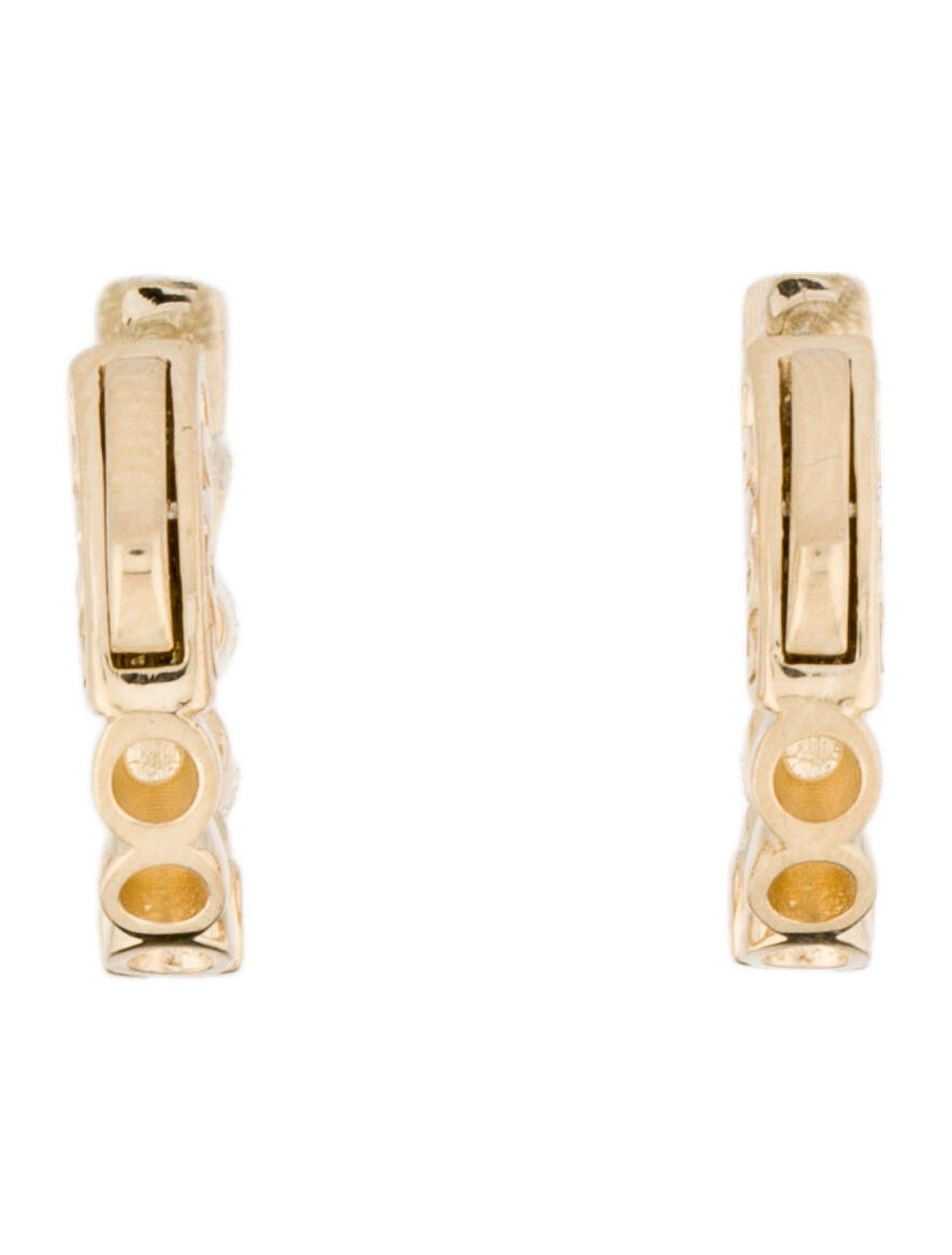 Quality Earrings Set: Made from real 14k gold and 28 glittering natural white approximately 0.50 ct. Certified diamonds, featuring a single line of prong set white diamonds 1/2