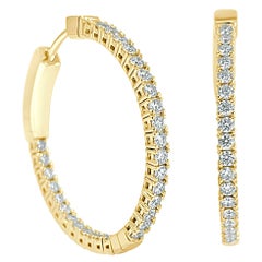 Flexible Creolen aus 14 Karat Gelbgold mit 1,09 Karat Diamant