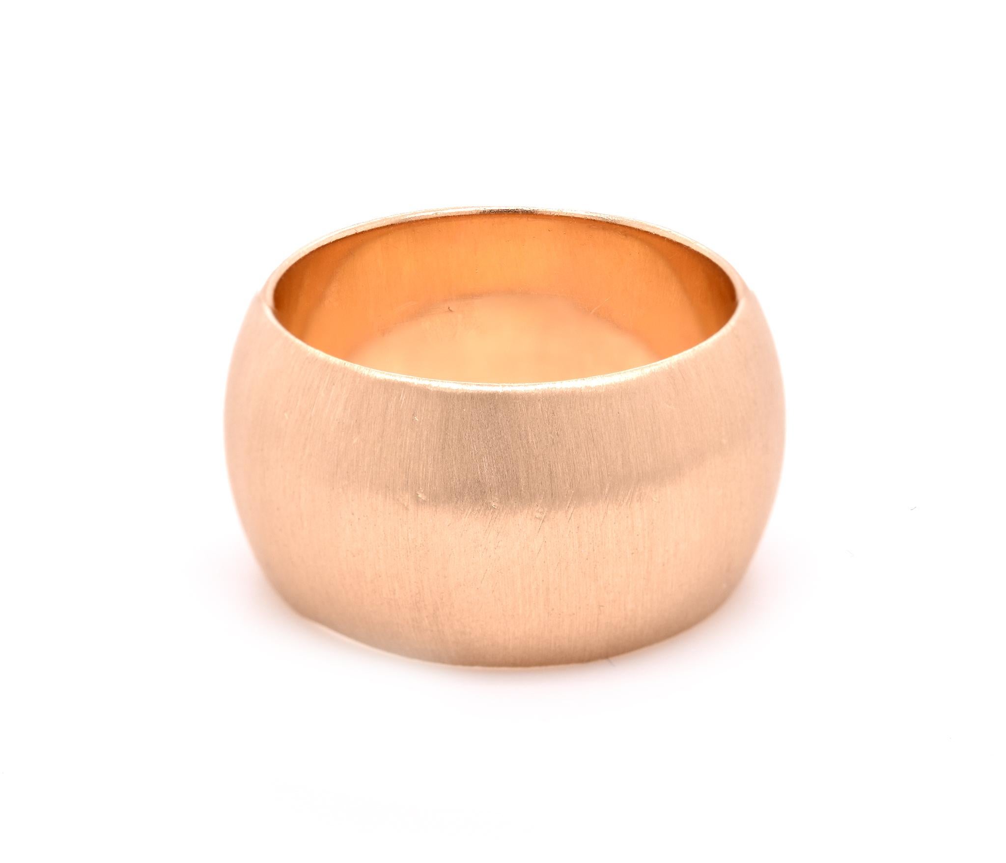 Designer: custom 
Material: 14K yellow gold 
Dimensions: the ring measures 12mm wide 
Size: 7.5
Weight:  13.65 grams