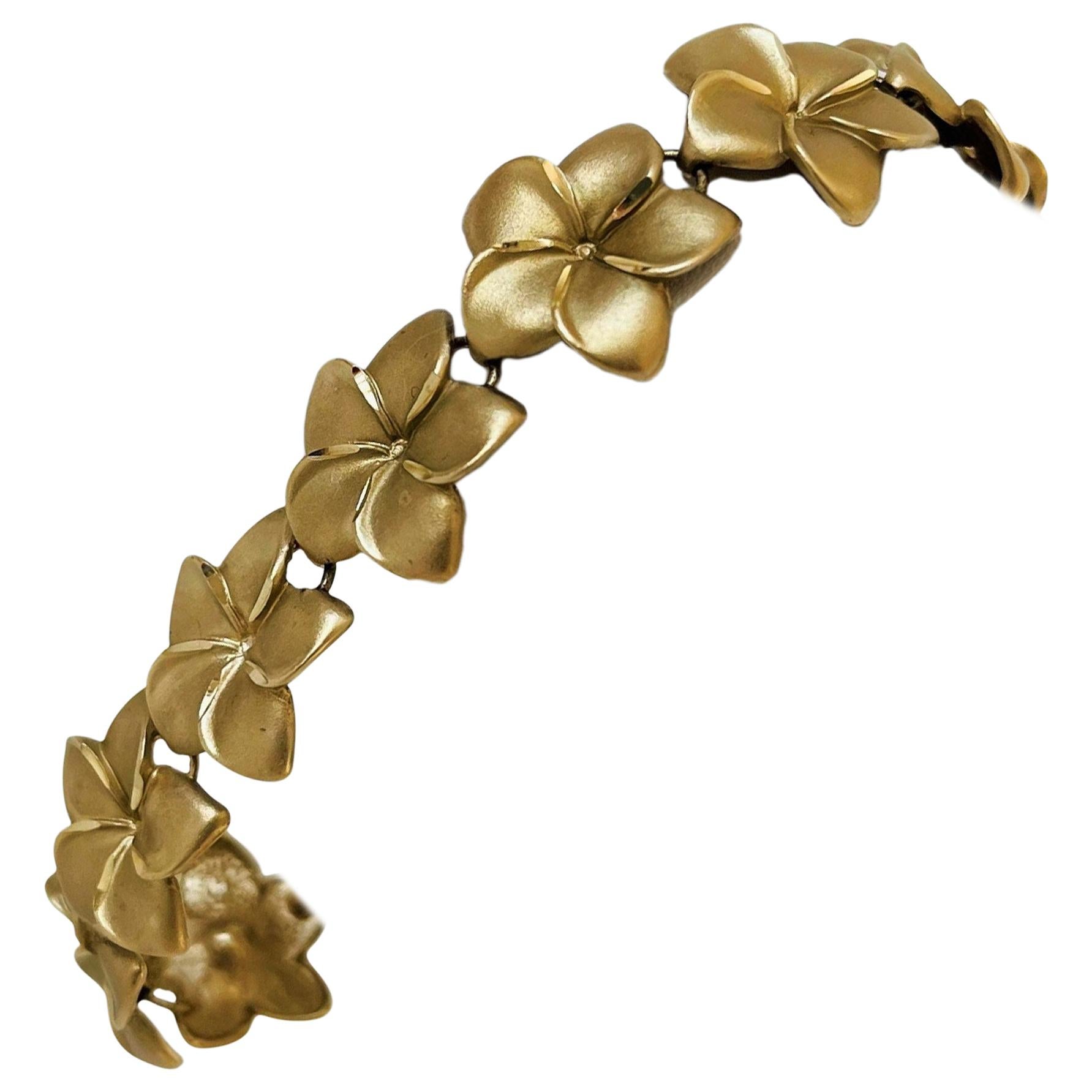 14 Karat Yellow Gold 15.7g Ladies Satin Finish Floral Link Bracelet