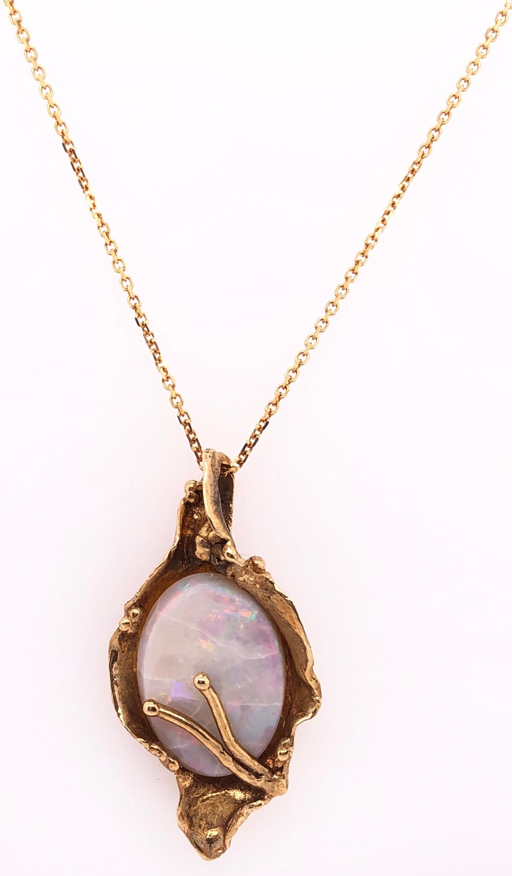 Contemporary 14 Karat Yellow Gold Necklace with Freeform Oval Opal and Gold Pendant For Sale